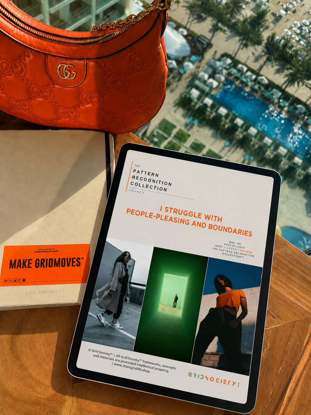 Pattern Recognition Workbook Vol. 2, I Struggle with People-Pleasing and Boundaries, displayed on a tablet overlooking a pool and palm trees in Dubai for self-reflection, inner work and journaling while travelling.