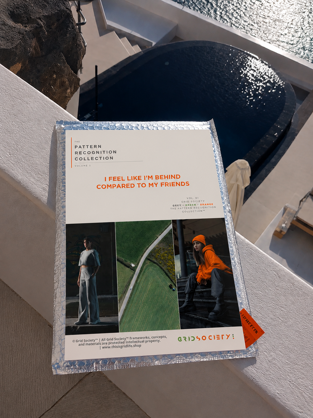 Pattern Recognition Workbook Vol. 1, I Feel Like I’m Behind Compared to My Friends, used for self-reflection, inner work and journaling beside the infinity pool at Porto Fira Suites in Santorini, Greece.